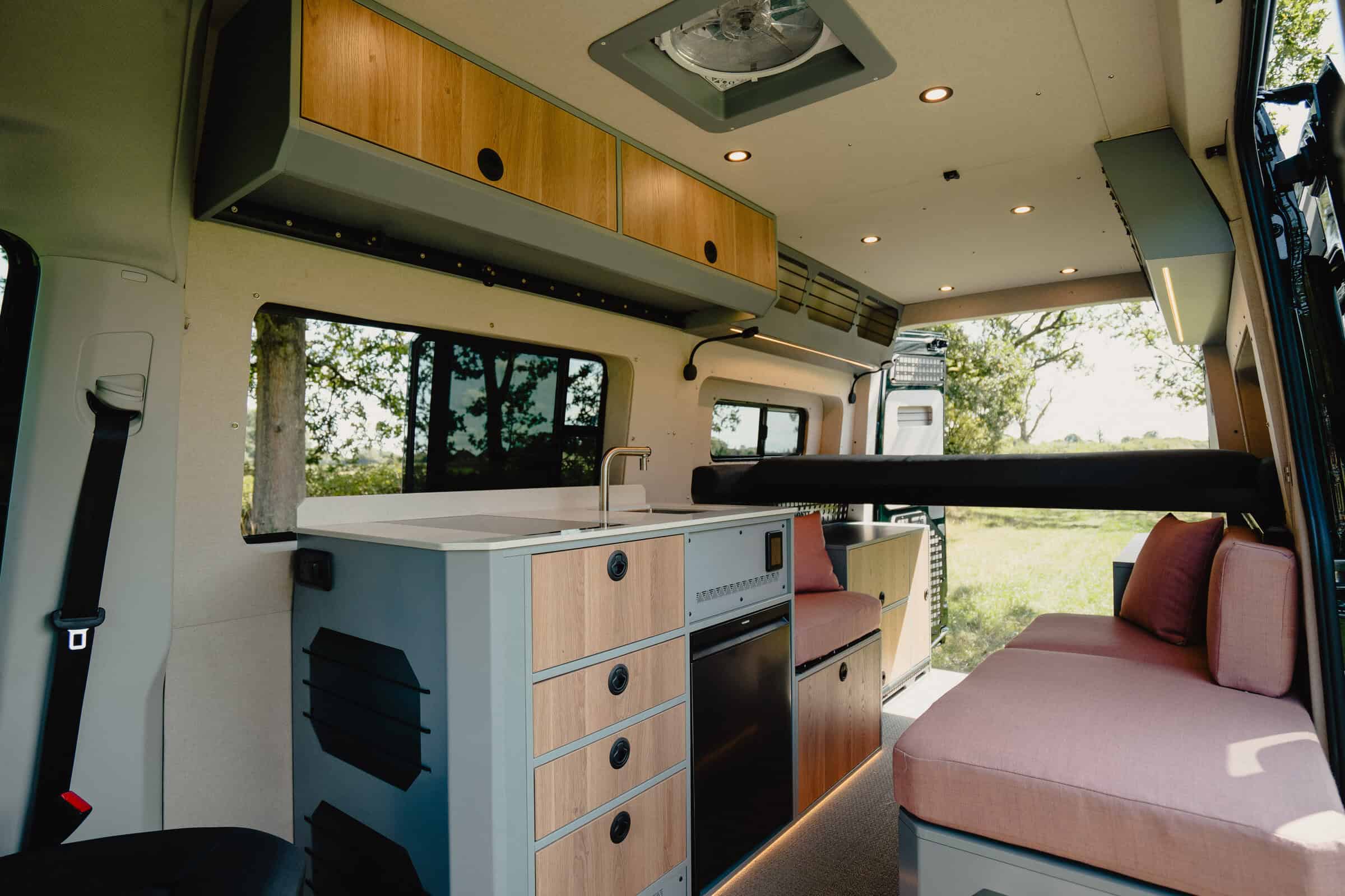 Interior of an Onyx adventure campervan — open living area