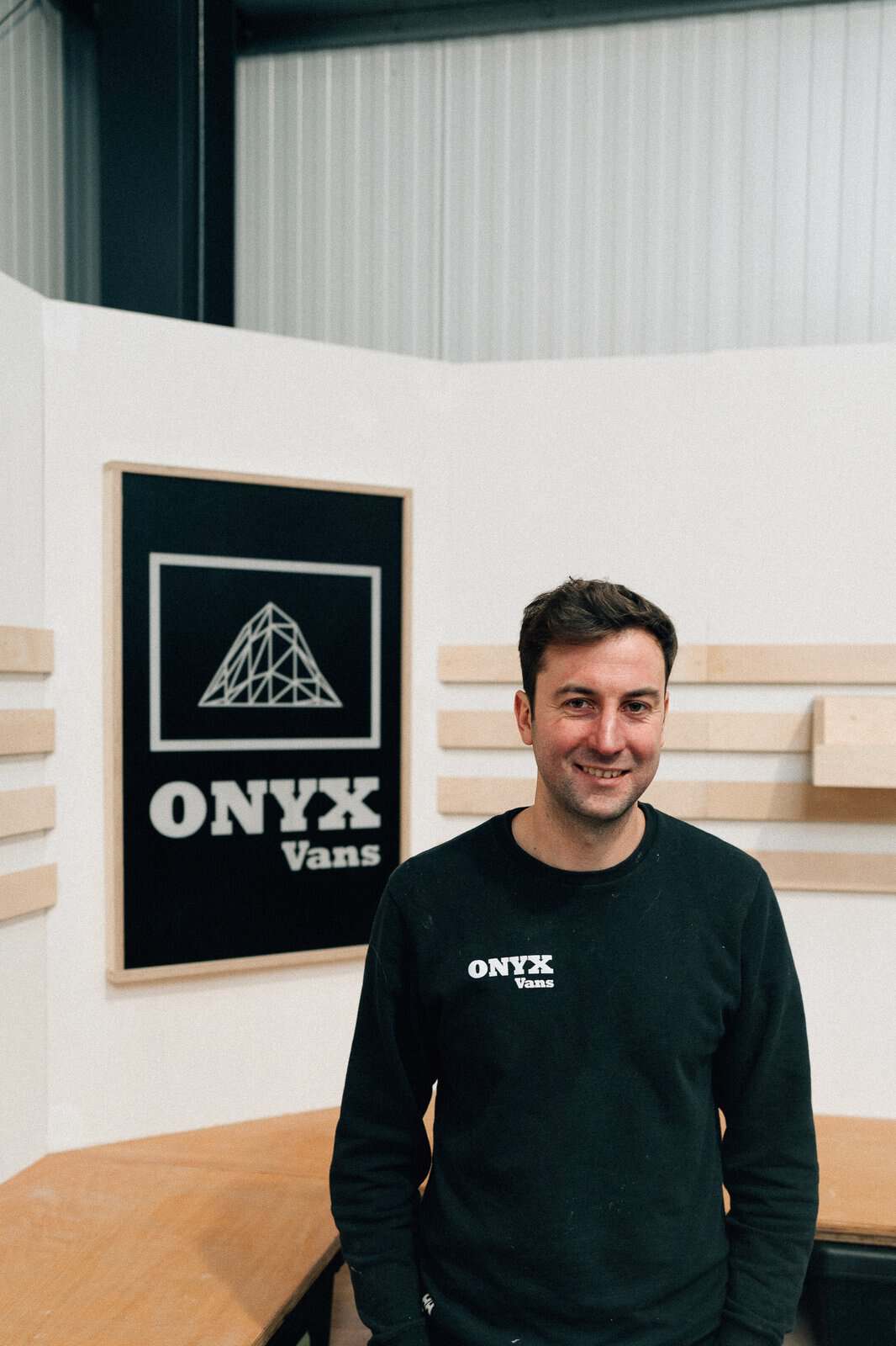 Chris, co-founder of Onyx Vans, at the West Sussex workshop
