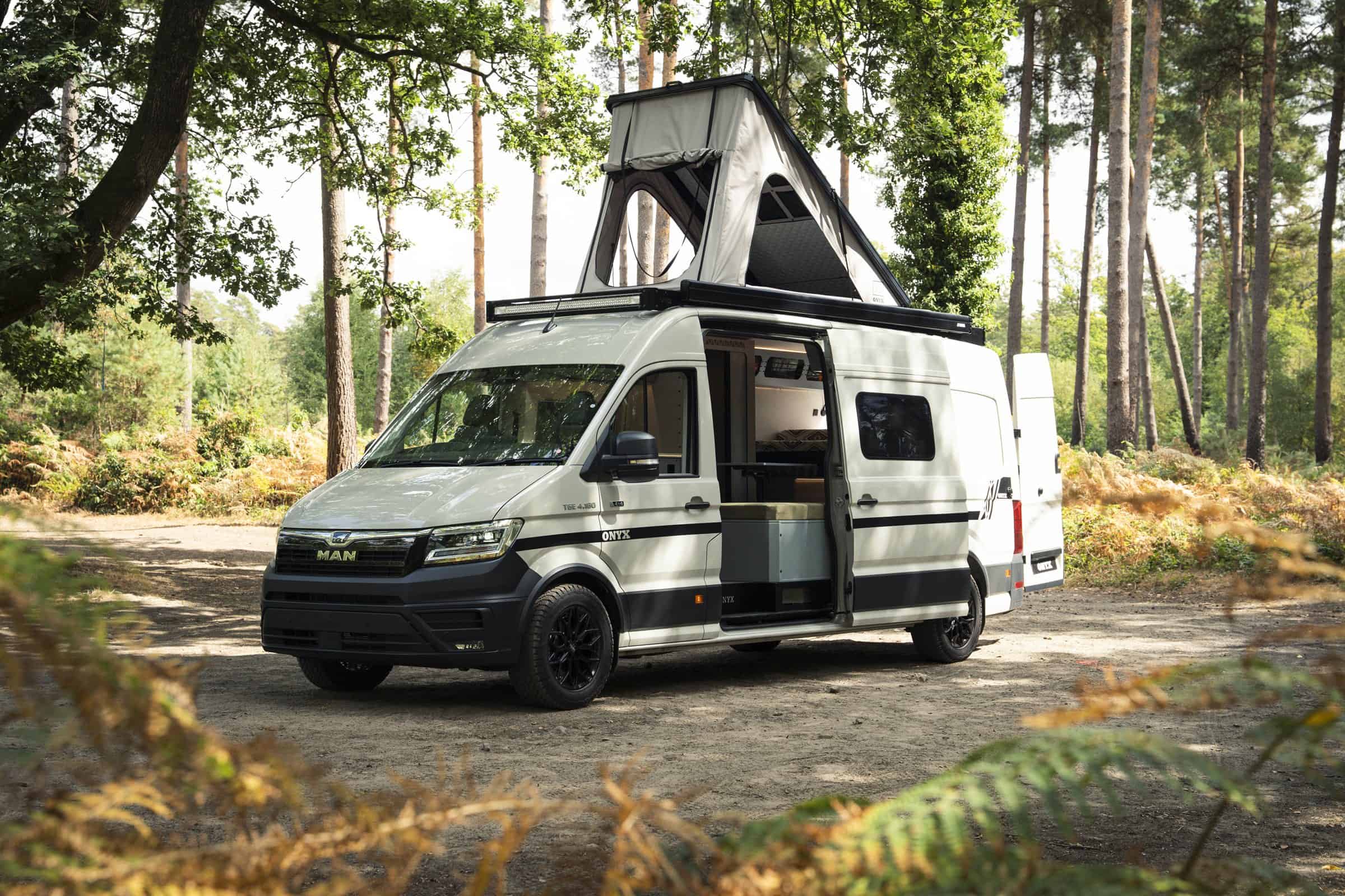 The Onyx Arête in woodland with the pop-top raised and the side door open