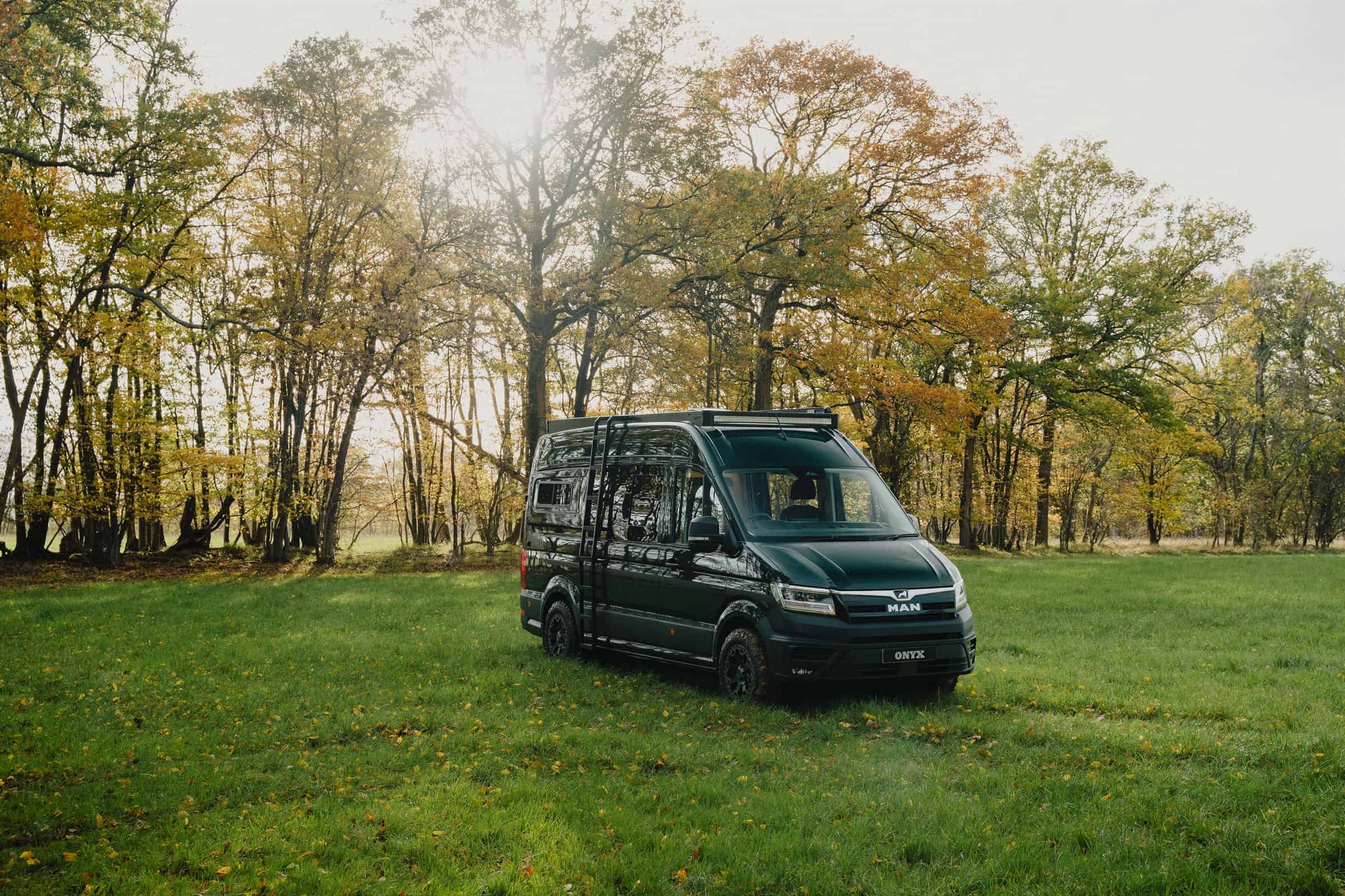 The Onyx Summit parked in a meadow in autumn
