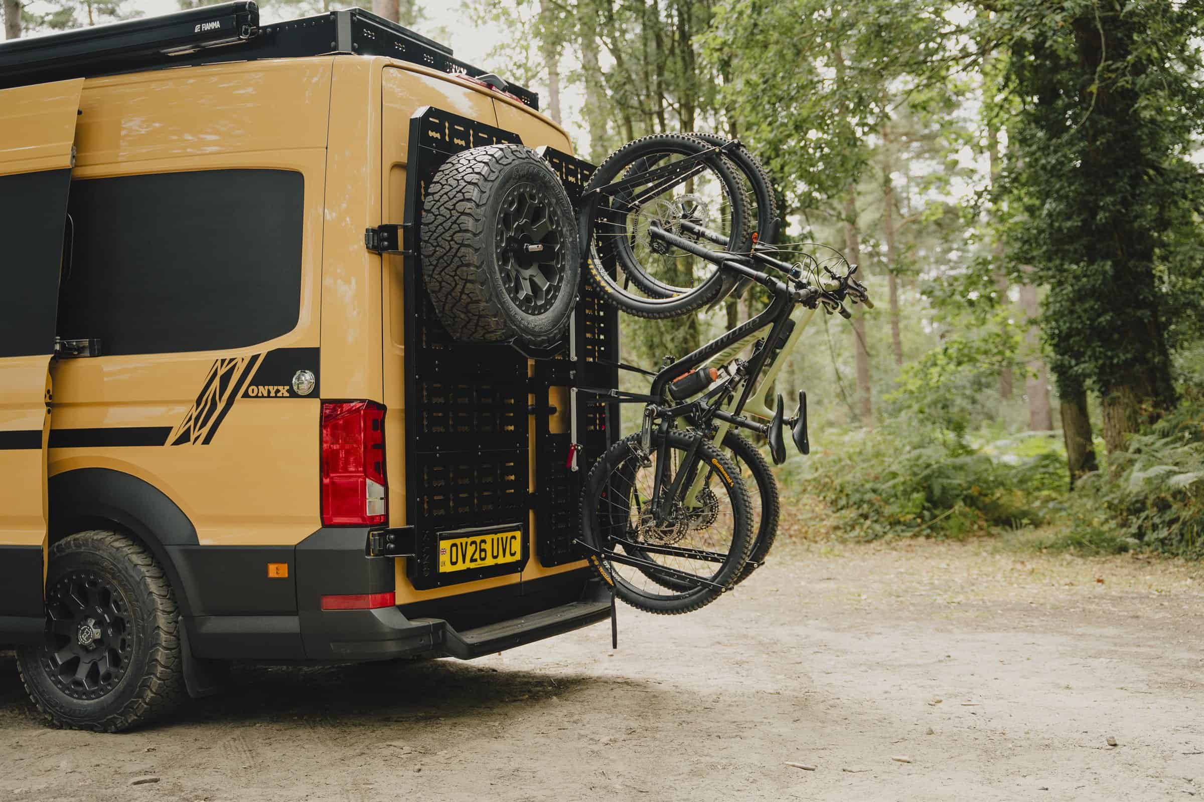 A mountain bike carried on the rear of the Onyx Outpost