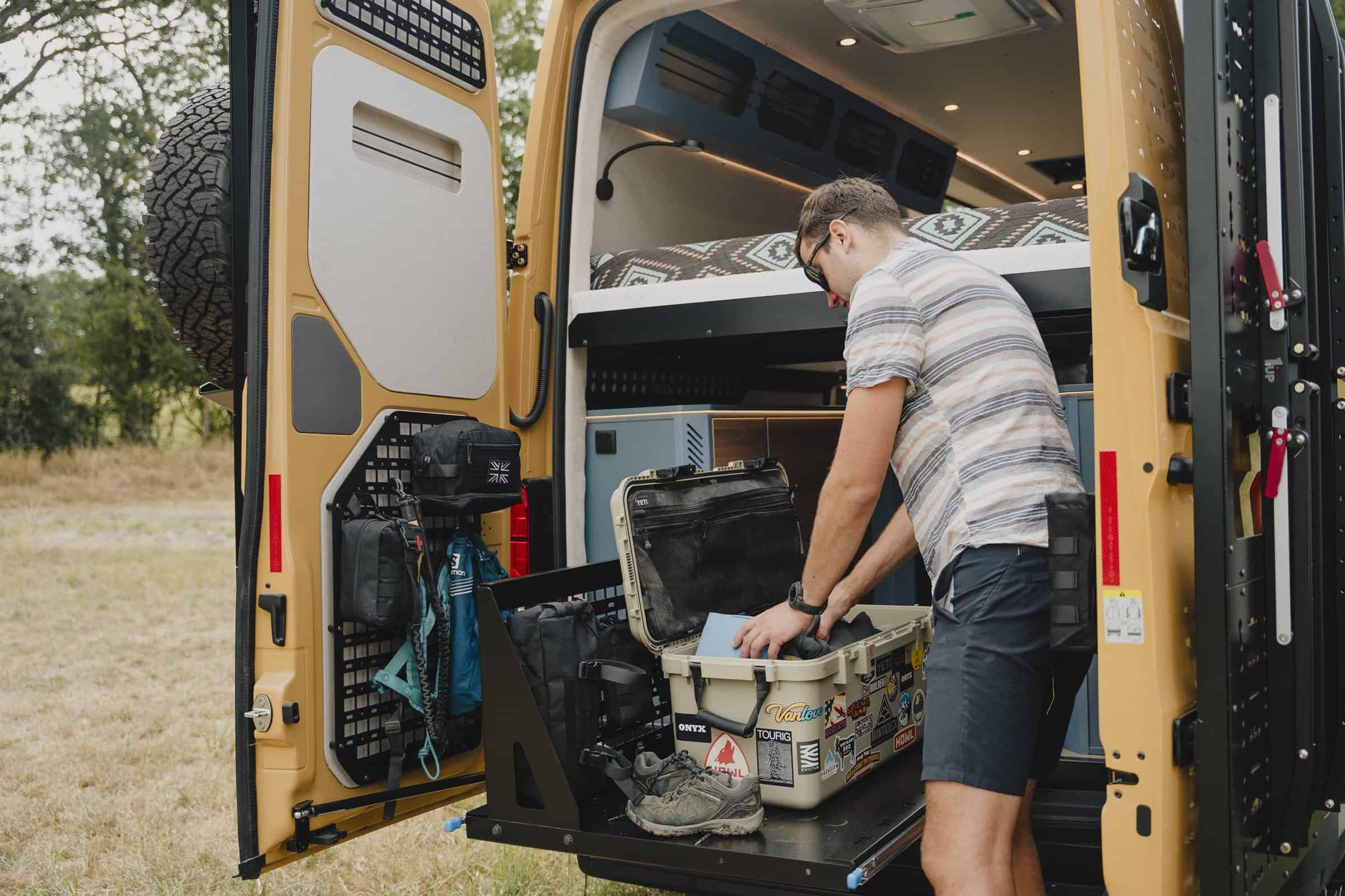 Loading the rear garage of the Onyx Mesa with the slide-out tray extended