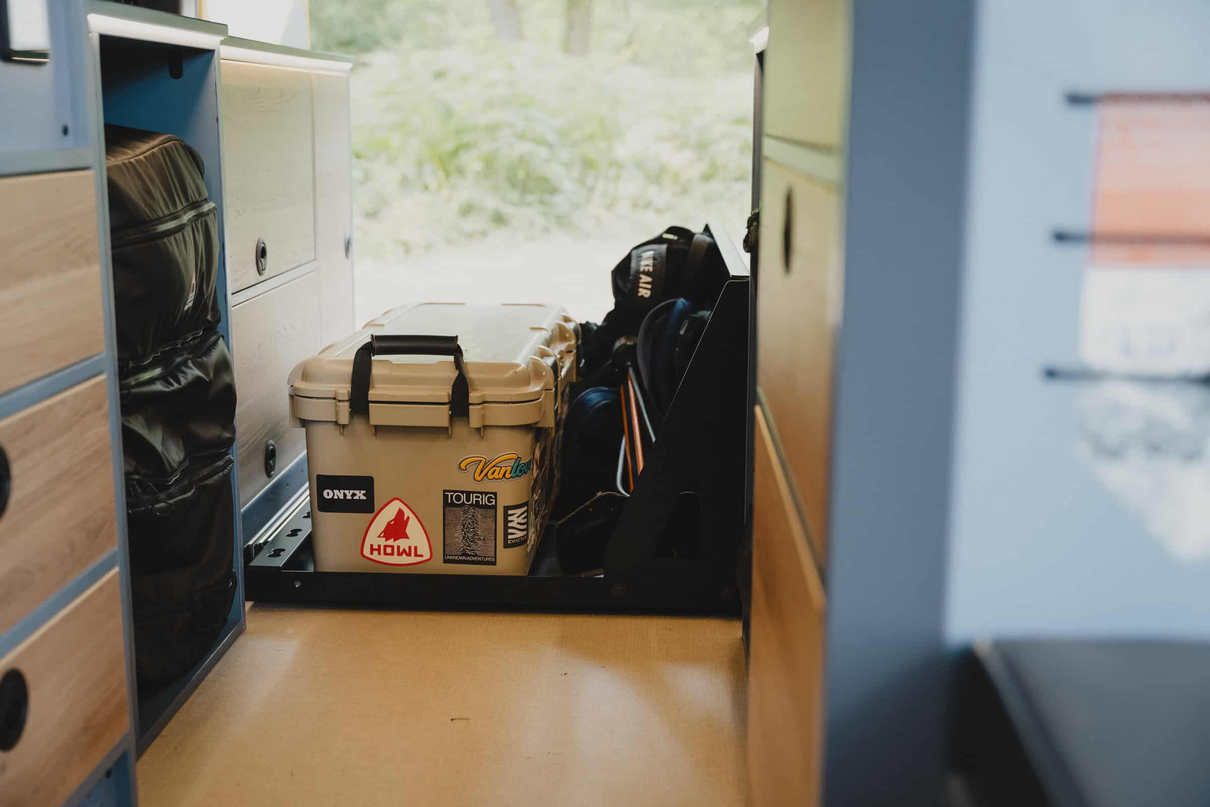 Vandrobe storage cabinets and packing space in the Onyx Outpost campervan