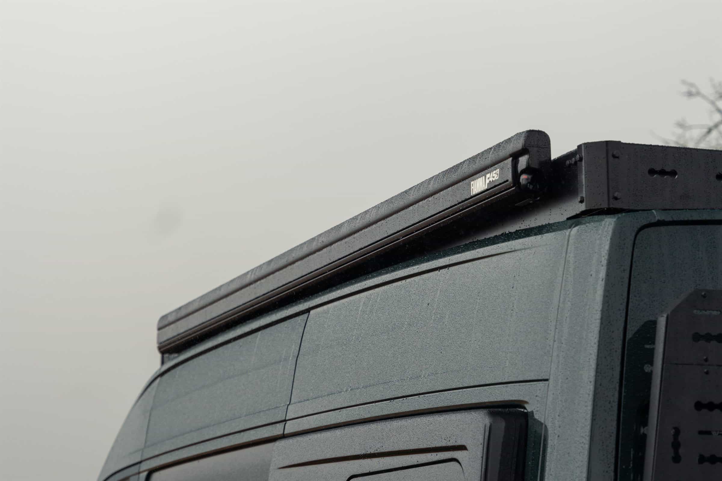 An awning cassette mounted along the side of the Onyx roof rack