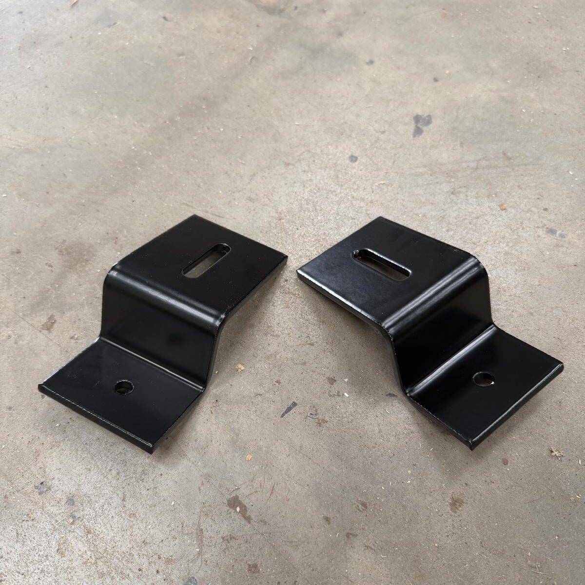 A pair of Onyx solar mounting brackets for the roof rack