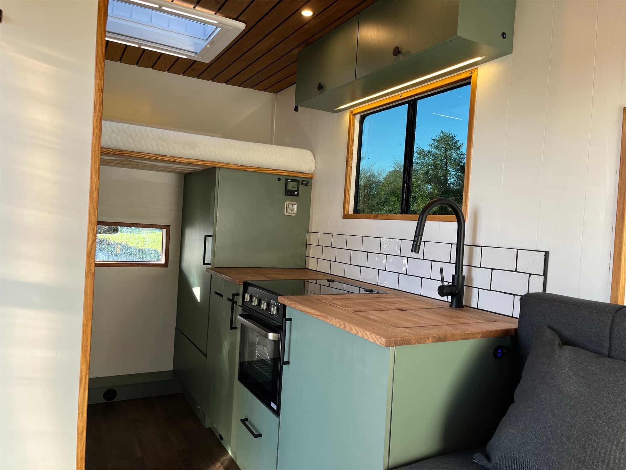 Luton conversion kitchen and bed