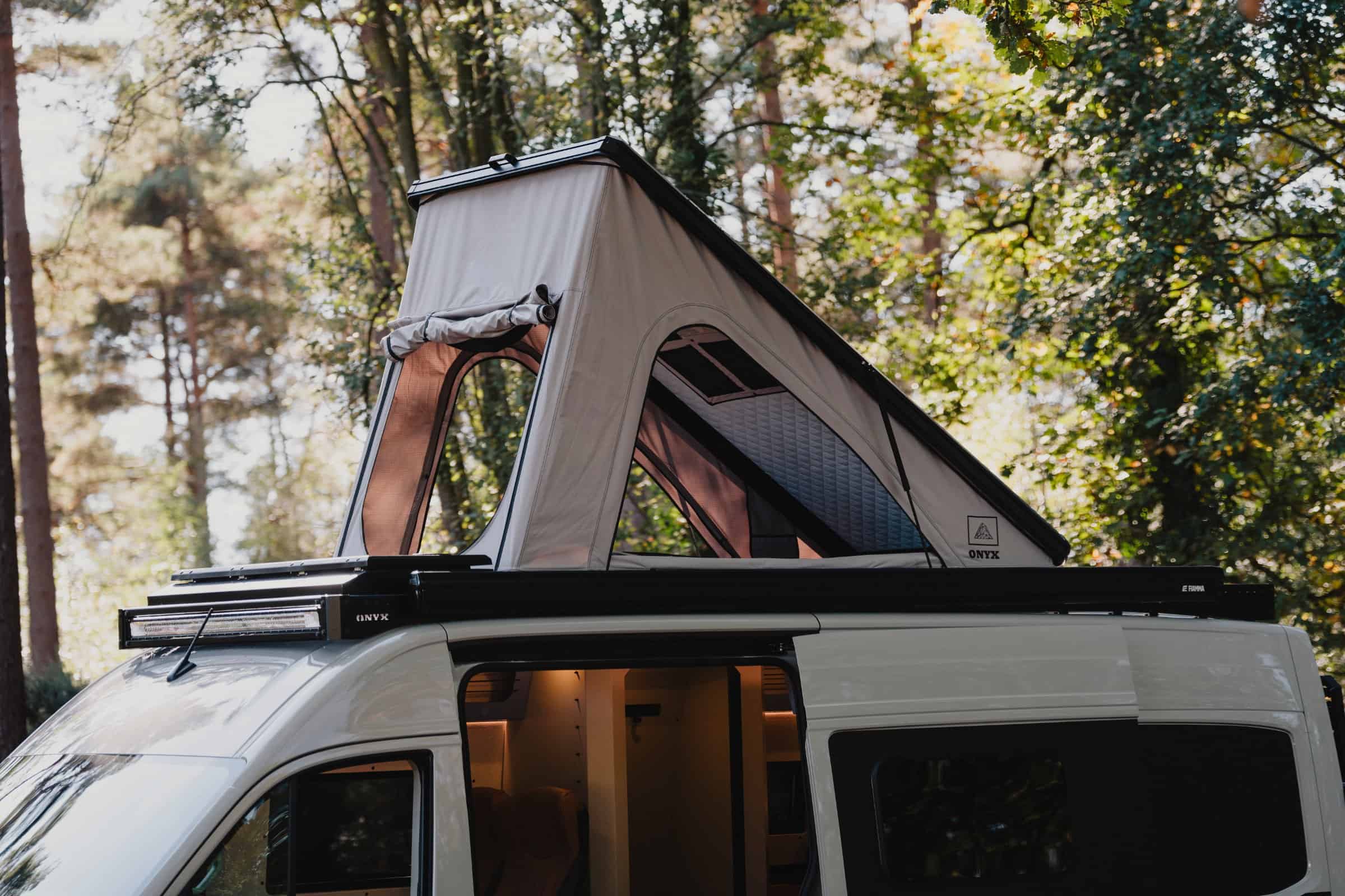 The raised Onyx pop-top and roof rack on the Mesa, seen from below